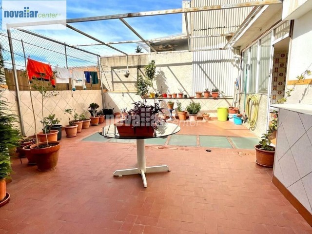 CASA CON LOCAL Y TERRAZA